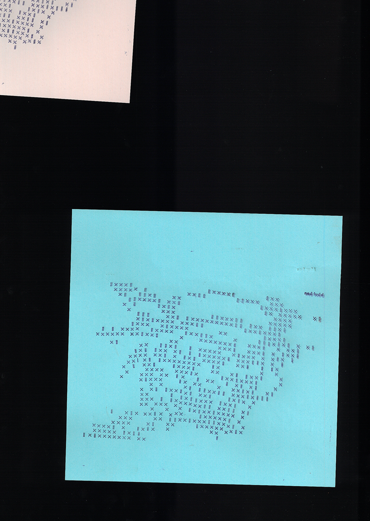 Tête de Ned Ludd recomposée en caractère de plomb X I. Du ascii sans numérique.